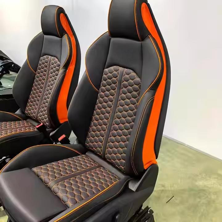 Premium Electric Car Seats - Black Orange Leather Honeycomb Stitching Ergonomic Support Interior Upgrade Comfort