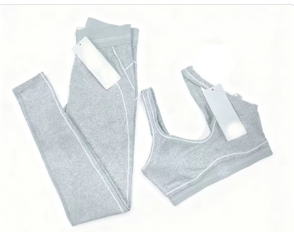 Hot Style Fashion Yoga Pilates Stretch Seamless Ribbed High-quality Leggings 2 Piece Set for Women