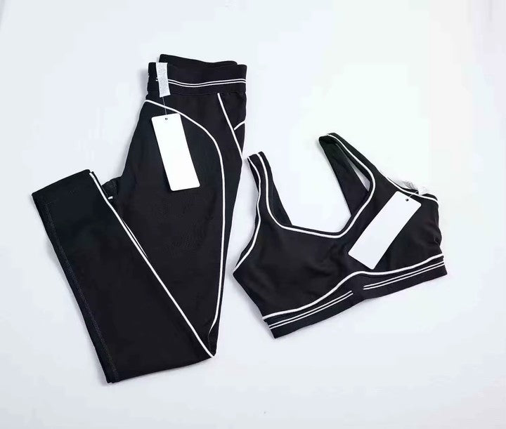 Hot Style Fashion Yoga Pilates Stretch Seamless Ribbed High-quality Leggings 2 Piece Set for Women